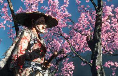 Atsu in profile, covered in blood under bright pink cherry blossoms.
